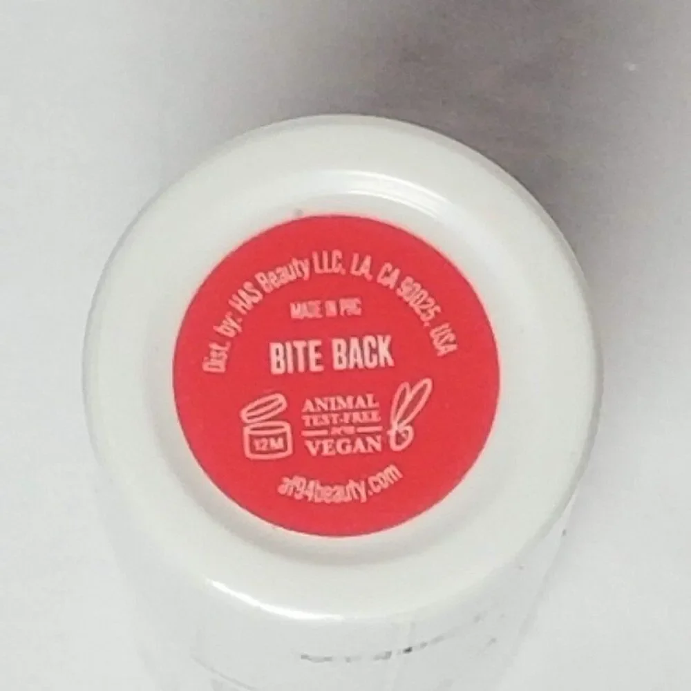 AF94 - Playdate Multi-Use Cheek + Lip Color in Bite Back (coral red)